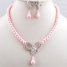 2016 Luxrious Exquisite Imitate Pearl Necklace Earring Jewelry Set Irregular Hollow Diamond Bow Pendant Necklace