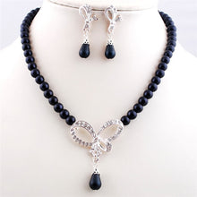 2016 Luxrious Exquisite Imitate Pearl Necklace Earring Jewelry Set Irregular Hollow Diamond Bow Pendant Necklace