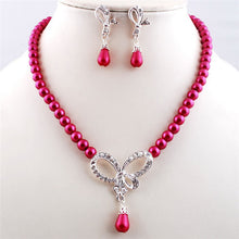 2016 Luxrious Exquisite Imitate Pearl Necklace Earring Jewelry Set Irregular Hollow Diamond Bow Pendant Necklace